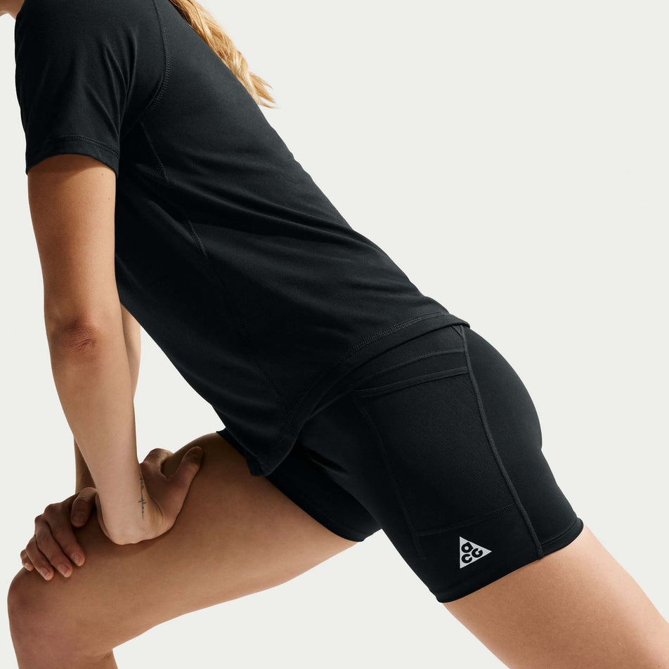 Side view of a model wearing the Nike Women's ACG Dri-FIT High-Waisted 4