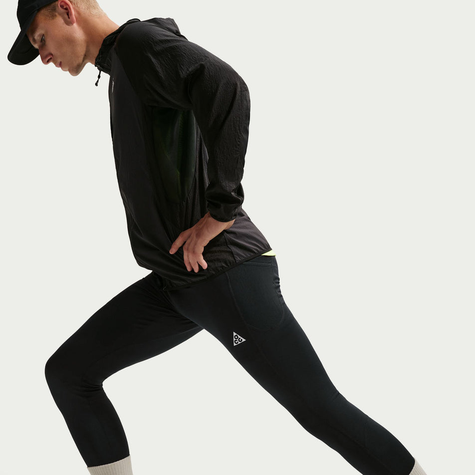 Side view of a model wearing the Nike Men's ACG