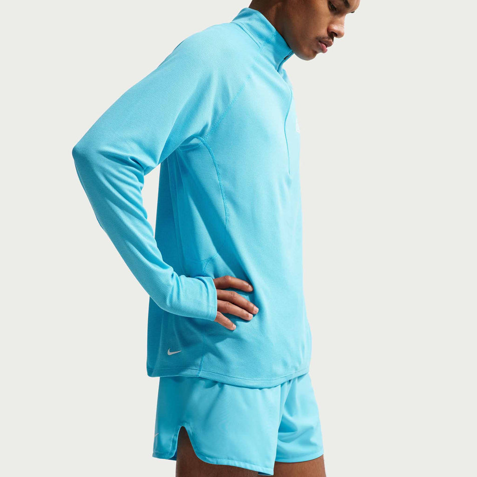 Angled view of a model wearing the Nike Men's ACG