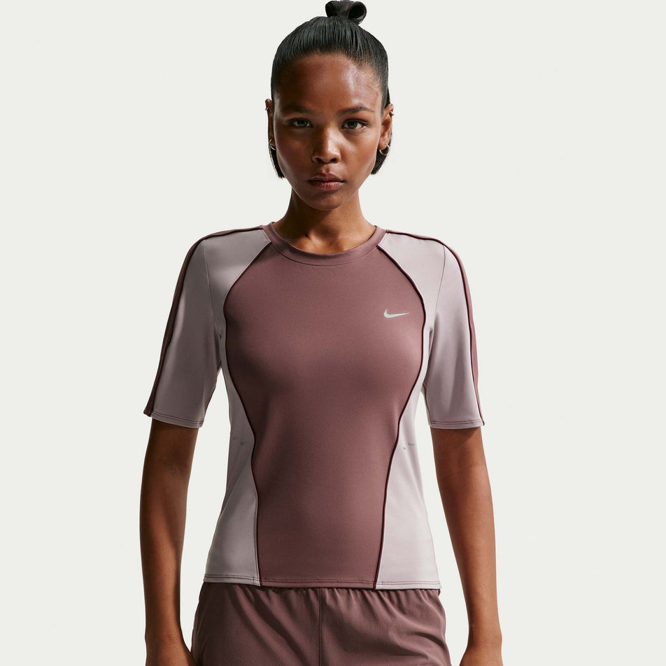 Front view of the Nike Women's Swift Dri-FIT Short-Sleeve Running Top in the Tattoo/Light Violet Ore/Reflective Silver colourway.