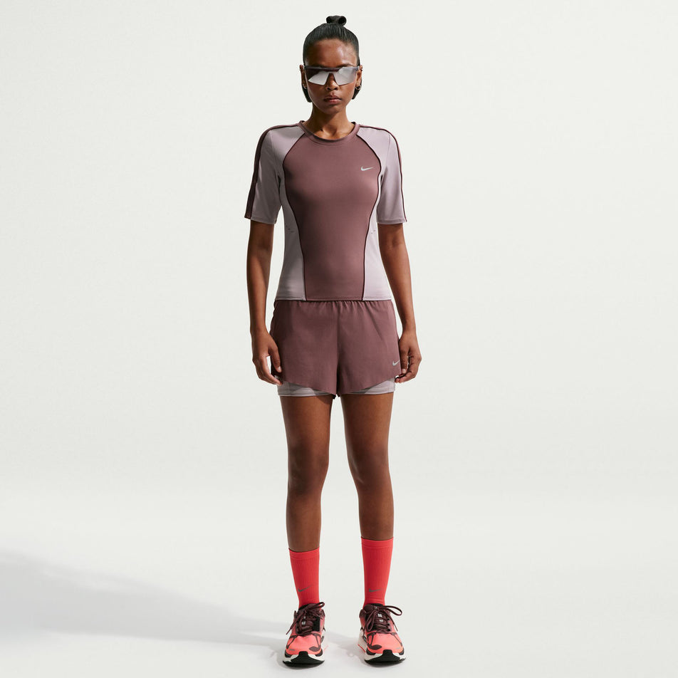 Front view of the Nike Women's Swift Dri-FIT Short-Sleeve Running Top in the Tattoo/Light Violet Ore/Reflective Silver colourway.