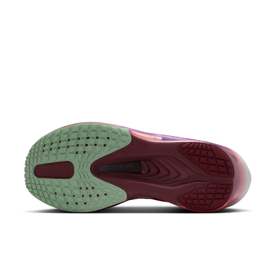The outsole of the left shoe from a pair of Nike Women's Zoom Fly 6 SE Road Running Shoes in the Team Red/Barely Green-Bright Crimson colourway.