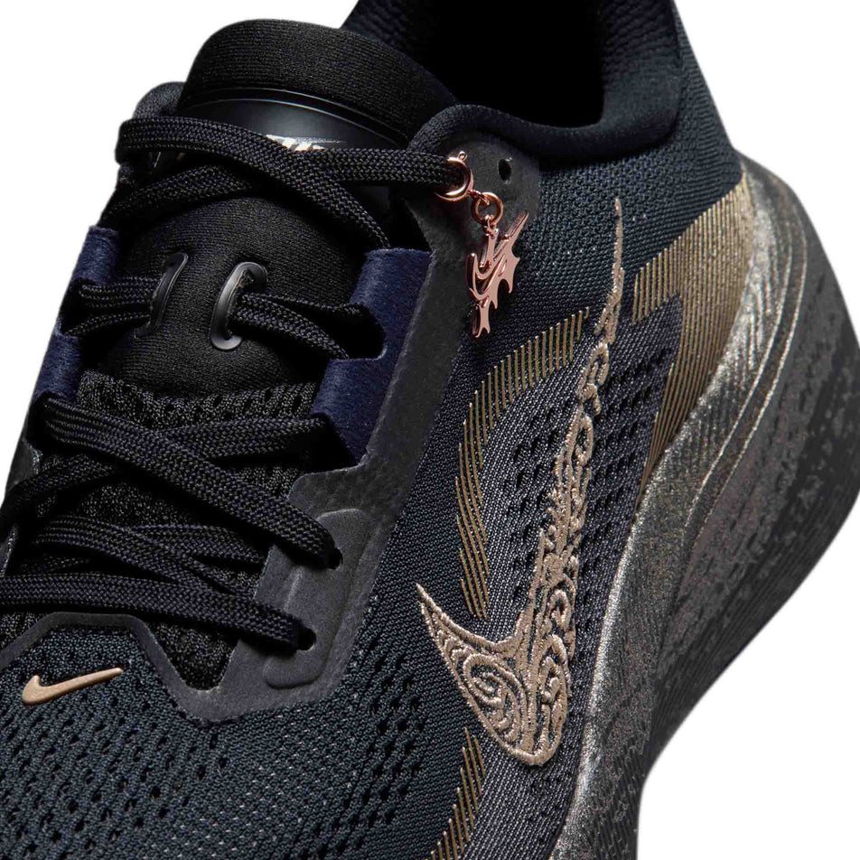 The upper of the left shoe from a pair of Nike Women's Pegasus 42