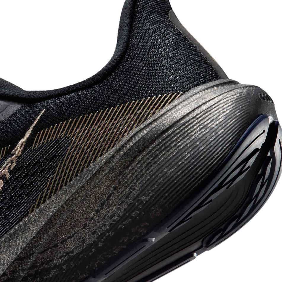 The rearfoot section of the left shoe from a pair of Nike Women's Pegasus 42