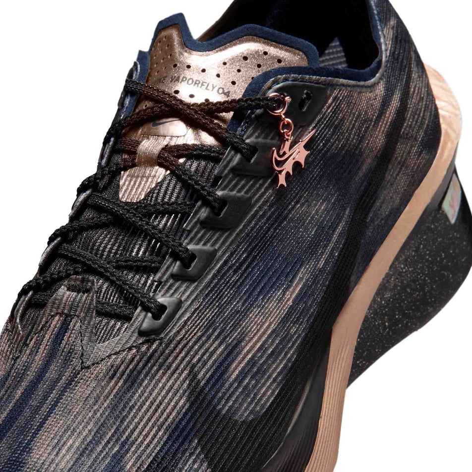 Close-up view of the upper of the left shoe from a pair of Nike Women's Vaporfly 4