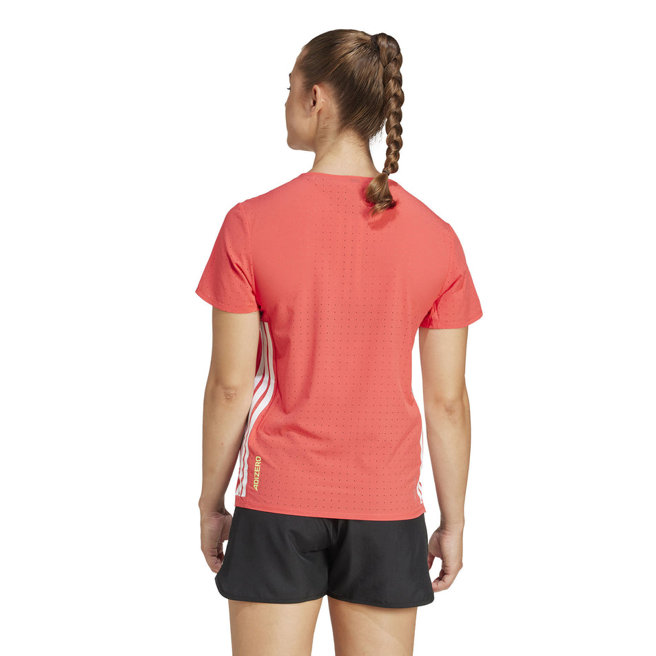 Back view of a model wearing the adidas Women's Adizero Tee in the Semi Lucid Red colourway. (8567020880034)
