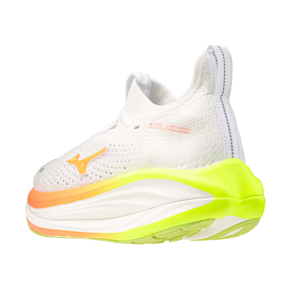 Lateral view of the left shoe from a pair of Mizuno Women's Neo Vista 3 Running Shoes in the White/Flamingo Coral/Lime Pulp colourway.