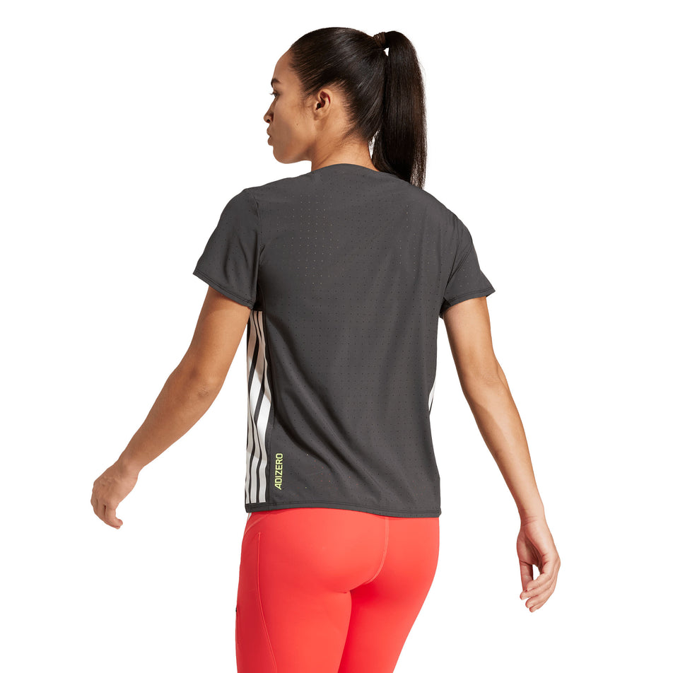Back view of a model wearing the adidas Women's Adizero Tee in the Black colourway.