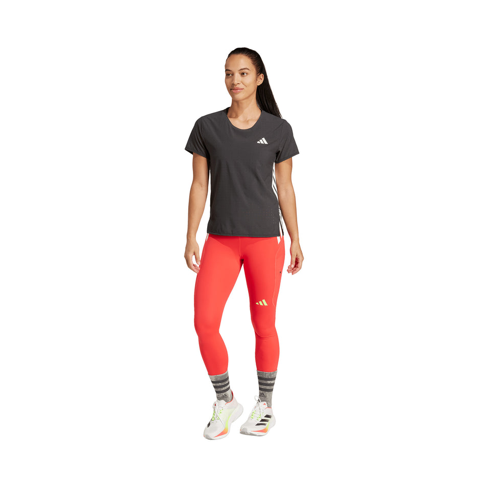 Front view of a model wearing the adidas Women's Adizero Tee in the Black colourway.