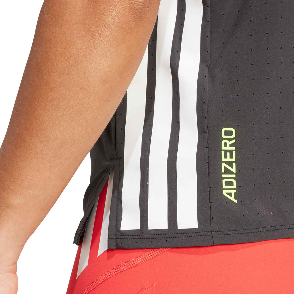 Close-up view of the Adizero branding on the adidas Women's Adizero Tee in the Black colourway.