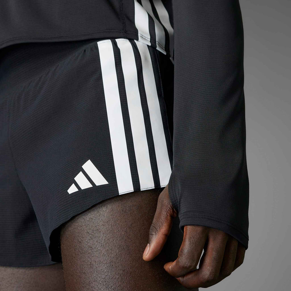 Front view of a model wearing the adidas Men's Adizero Gel Pocket Shorts in the Black colourway.