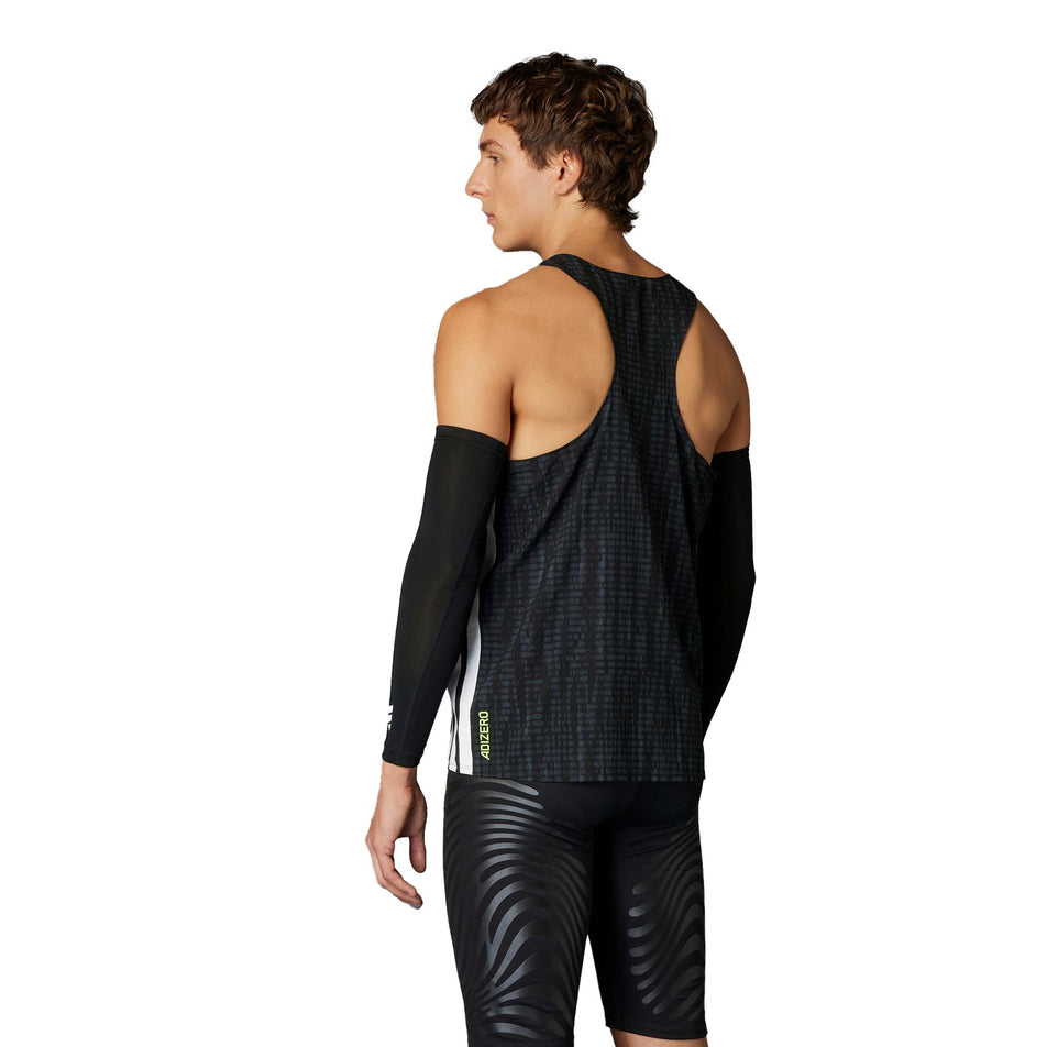 Back view of a model wearing the adidas Men's Adizero Singlet in the Carbon/Black colourway. (8599938433186)