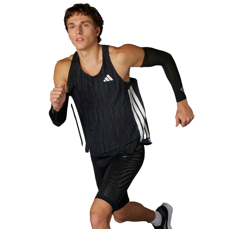 Front view of a model wearing the adidas Men's Adizero Singlet in the Carbon/Black colourway. (8599938433186)