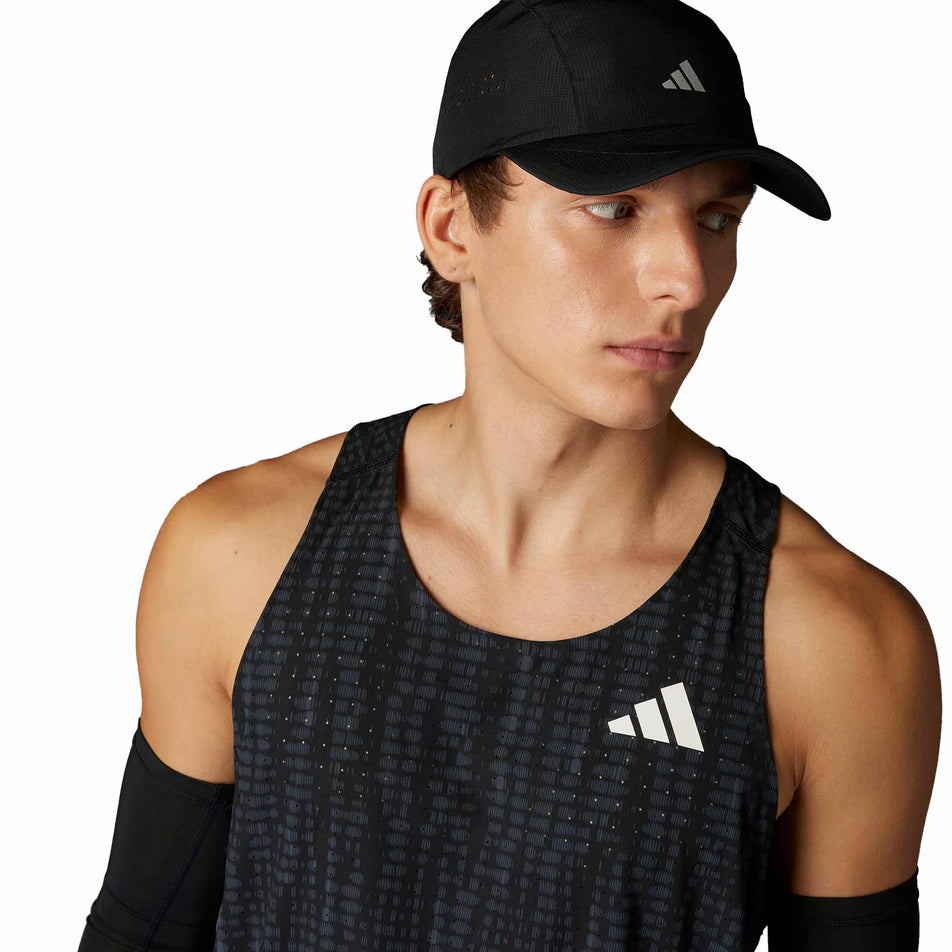 Front view of a model wearing the adidas Men's Adizero Singlet in the Carbon/Black colourway. (8599938433186)