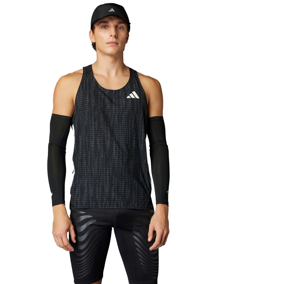 Front view of a model wearing the adidas Men's Adizero Singlet in the Carbon/Black colourway. (8599938433186)