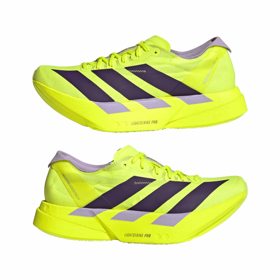 A pair of adidas Women's Adizero Adios Pro 4 Running Shoes in the Solar Yellow/Aurora Plum/Powder Plum colourway.
