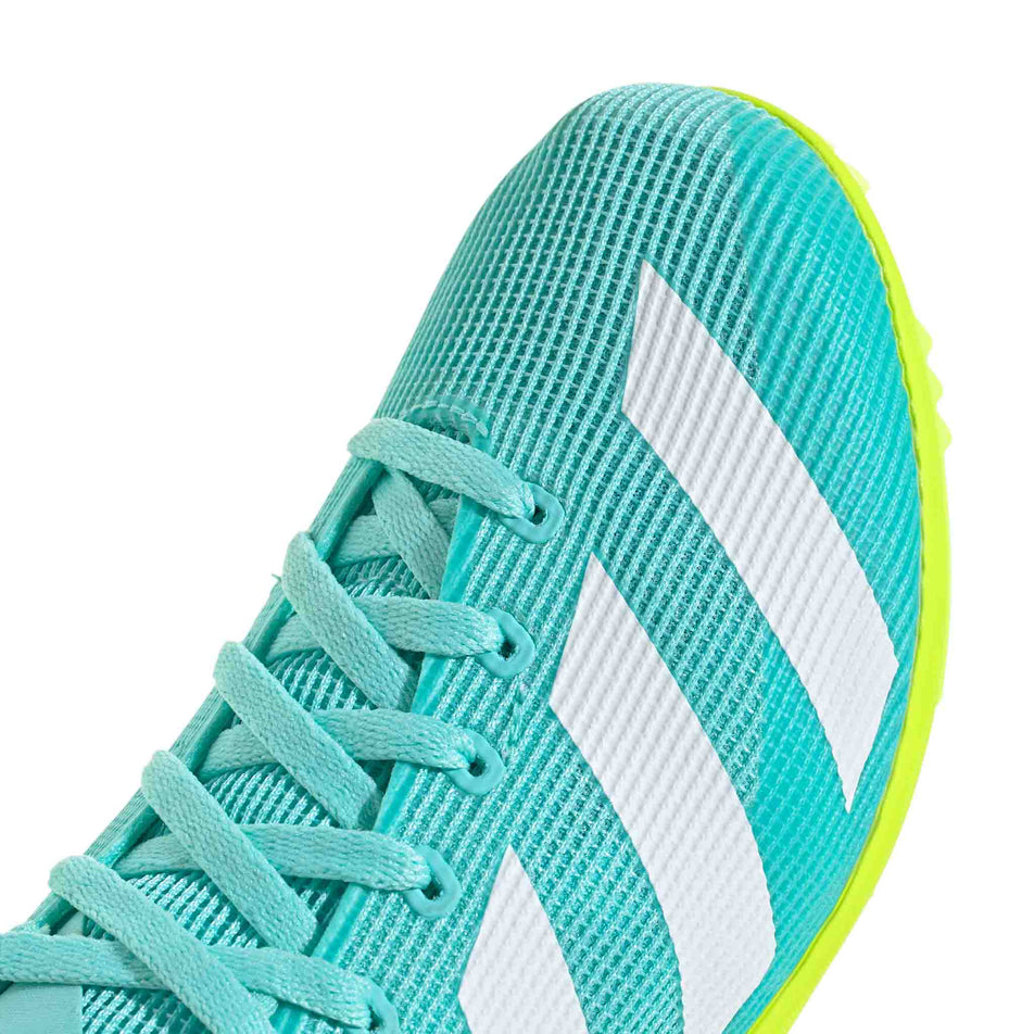 Close up of the toe box of the right shoe from a pair of adidas Junior-Unisex Allroundstar Running Spikes in the Flash Aqua/Ftwr White/Lucid Lemon colourway. (8663007232162)