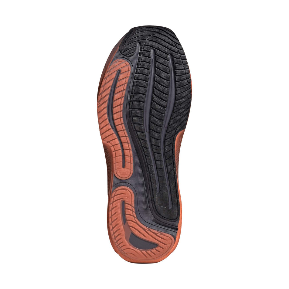 The outsole of the right shoe from a pair of adidas Men's Supernova Solution 3 Running Shoes in the Aurora Onix/Silver met./Lucid Orange colourway.