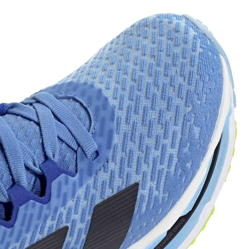 Close up of the toe box of the right shoe from a pair of adidas Men's Adistar BYD Running Shoes in the Blue Fusion/Legend Ink/Solar Slime colourway. (8662536290466)