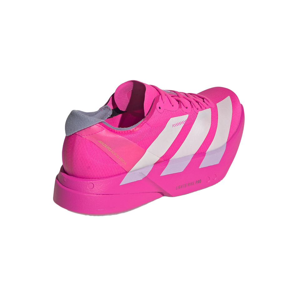 The right shoe from a pair of adidas Women's Adizero Adios Pro 4 Running Shoes in the Shock Pink/Zero Met./Aurora Plum colourway. (8745995337890)