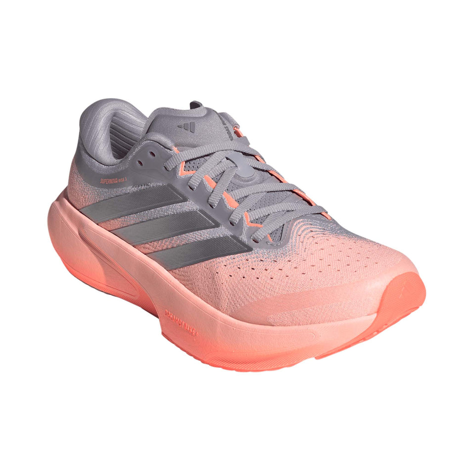 Lateral view of the right shoe from a pair of adidas Women's Supernova Rise 3 Running Shoes in the Clear Orange/Silver met./Glory Grey colourway.