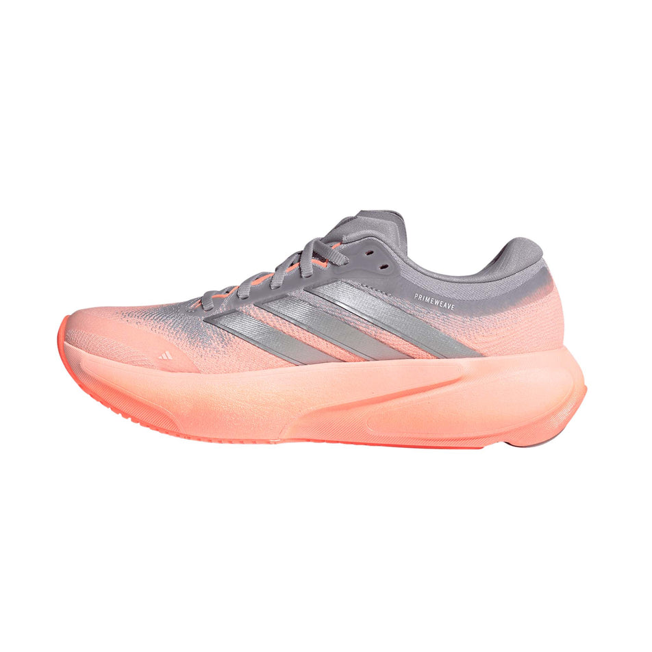 Medial view of the right shoe from a pair of adidas Women's Supernova Rise 3 Running Shoes in the Clear Orange/Silver met./Glory Grey colourway.