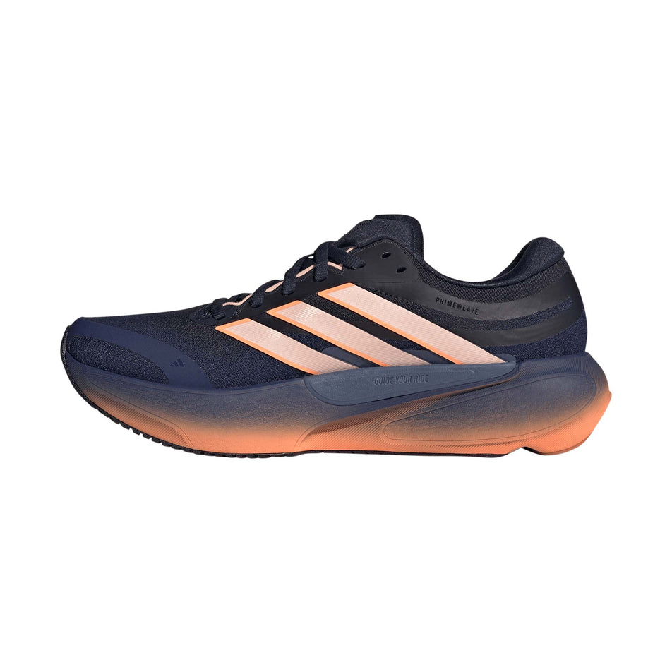 Medial view of the right shoe from a pair of adidas Women's Supernova Solution 3 Running Shoes in the Dark Blue/Clear Orange/Beam Orange colourway.