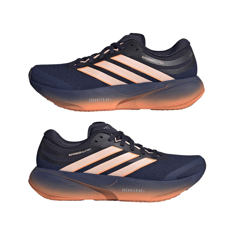 A pair of adidas Women's Supernova Solution 3 Running Shoes in the Dark Blue/Clear Orange/Beam Orange colourway.