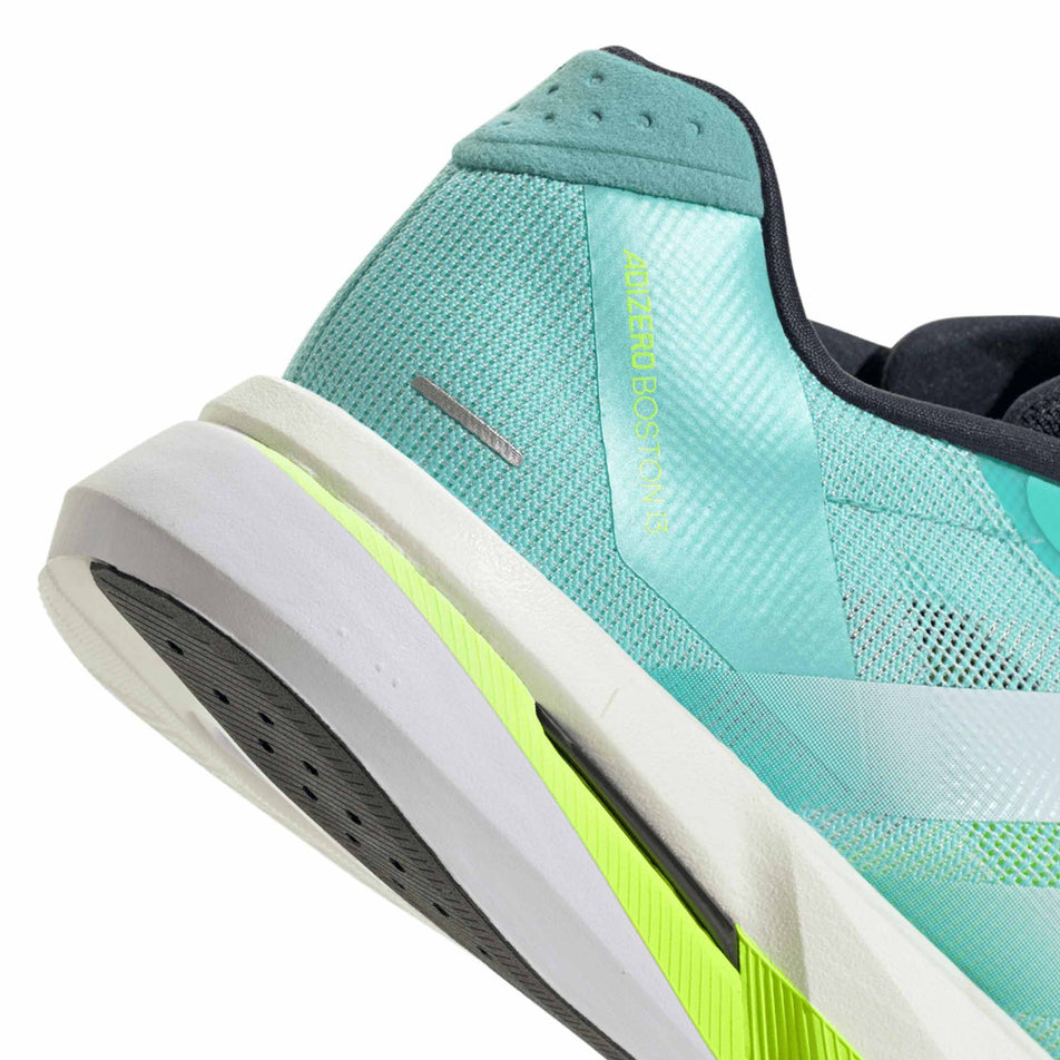 Close up of the heel section of the right shoe from a pair of adidas Men's Adizero Boston 13 Running Shoes in the Flash Aqua/Ftwr White/Lucid Lemon colourway. (8662519120034)