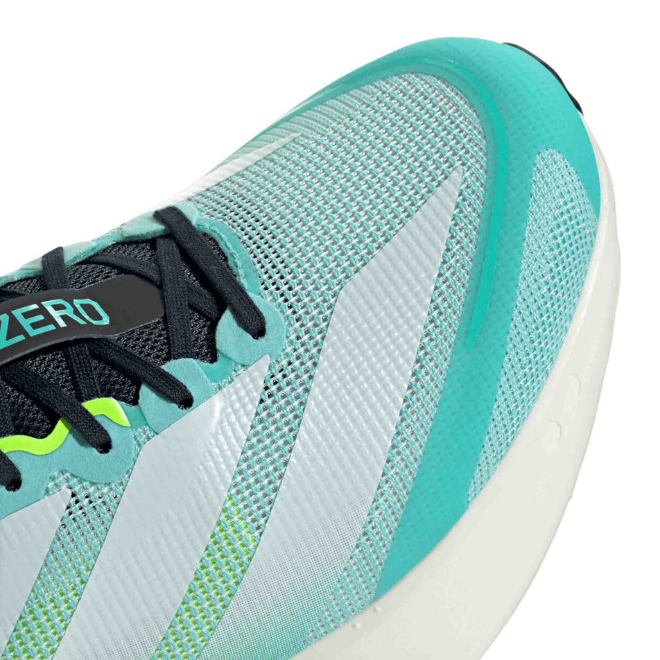 Close up of the toe box of the right shoe from a pair of adidas Men's Adizero Boston 13 Running Shoes in the Flash Aqua/Ftwr White/Lucid Lemon colourway. (8662519120034)