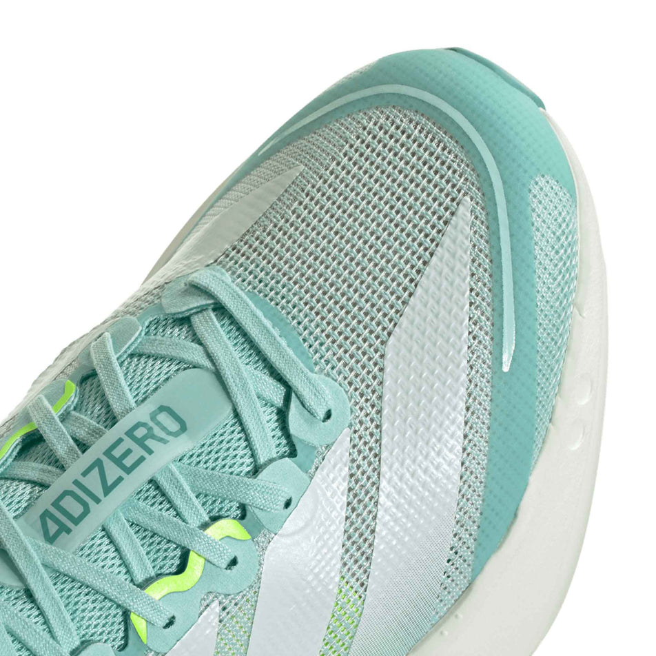 Close up of the toe box of the right shoe from a pair of adidas Women's Adizero Boston 13 Running Shoes in the Semi Flash Aqua/Zero Met./Lucid Lemon colourway. (8662573187234)