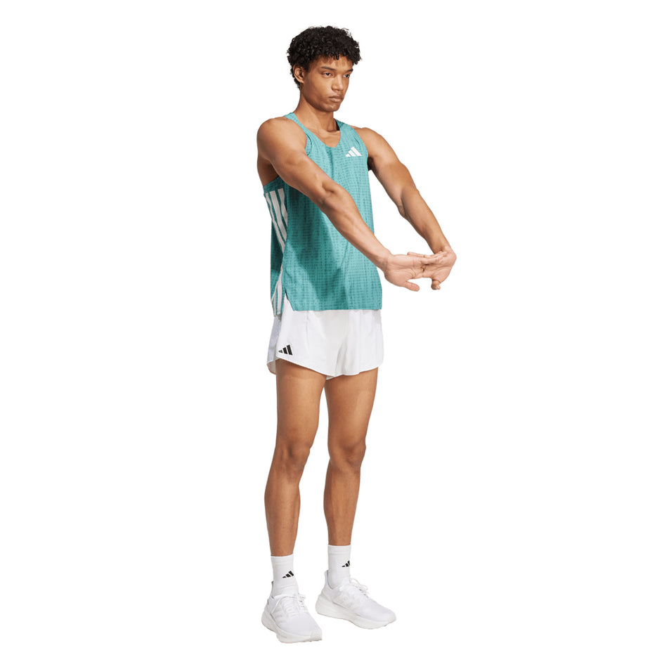 Front view of a model wearing the adidas Men's Adizero Singlet in the Powder Teal/Preloved Teal colourway. (8663045603490)