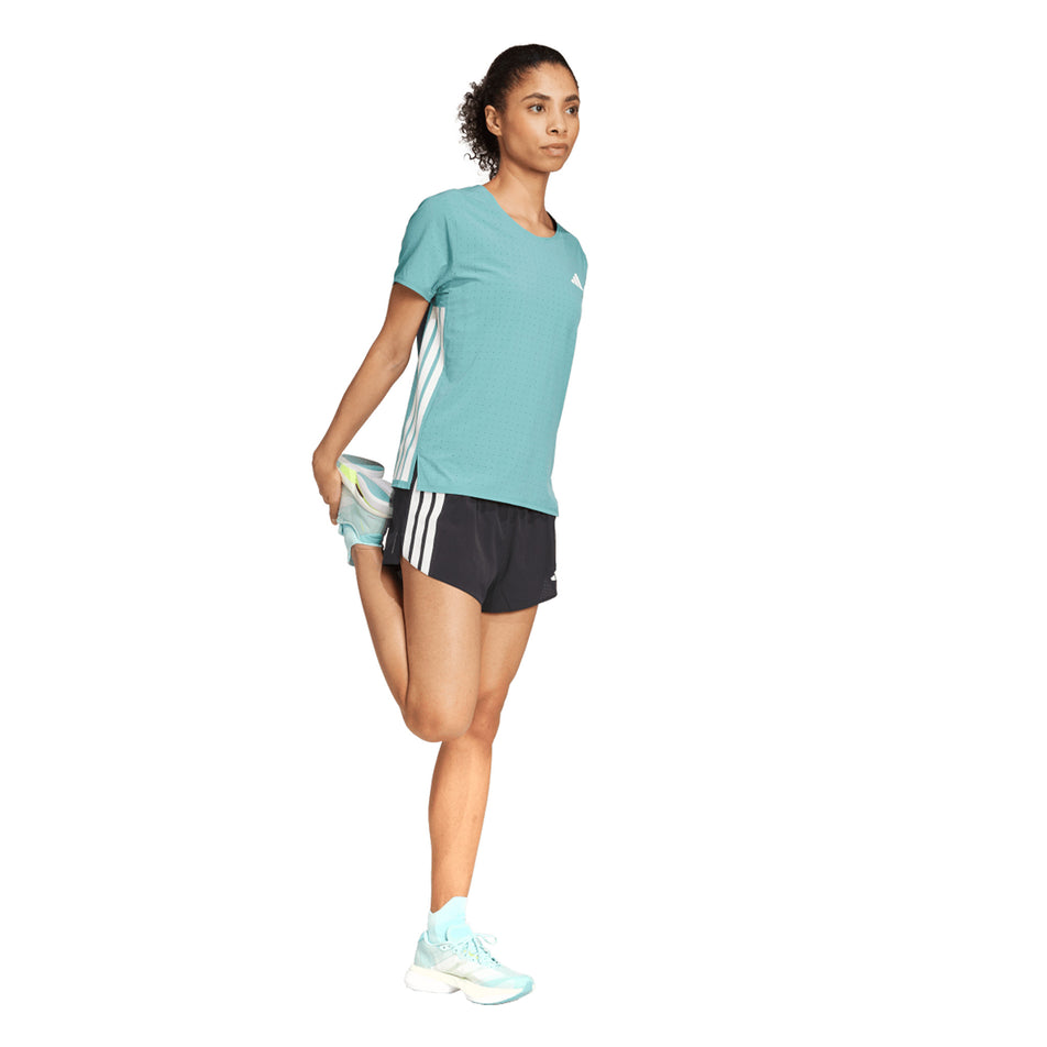 Front view of a model wearing the adidas Women's Adizero Tee in the Powder Teal colourway. (8665227231394)