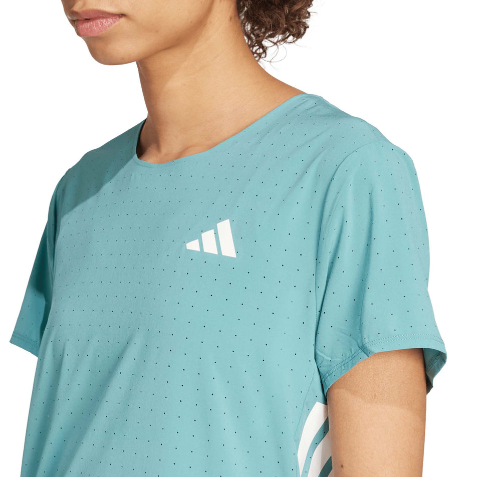 Front view of a model wearing the adidas Women's Adizero Tee in the Powder Teal colourway. (8665227231394)