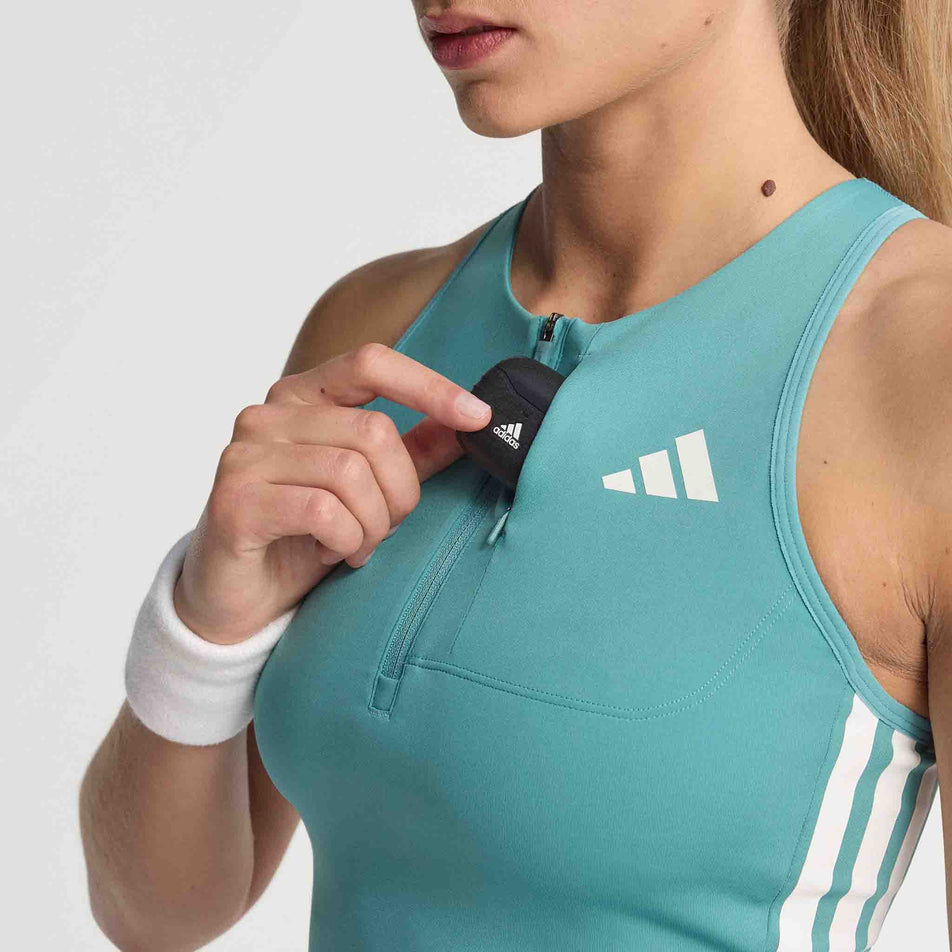 The zip pocket on the front of the adidas Women's Adizero Crop in the Powder Teal colourway. (8665221529762)