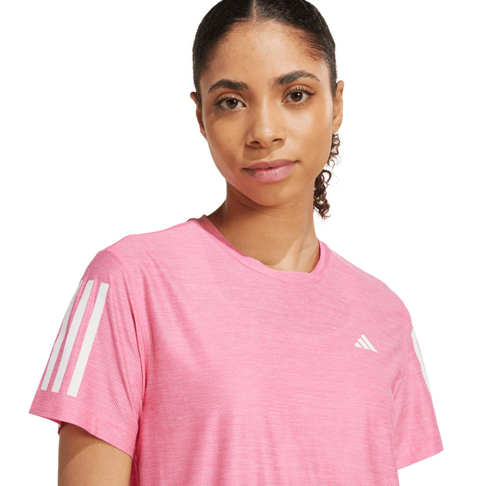 Front view of the adidas Women's Own The Run Base Tee in the Lucid Pink/White colourway. (8665232670882)