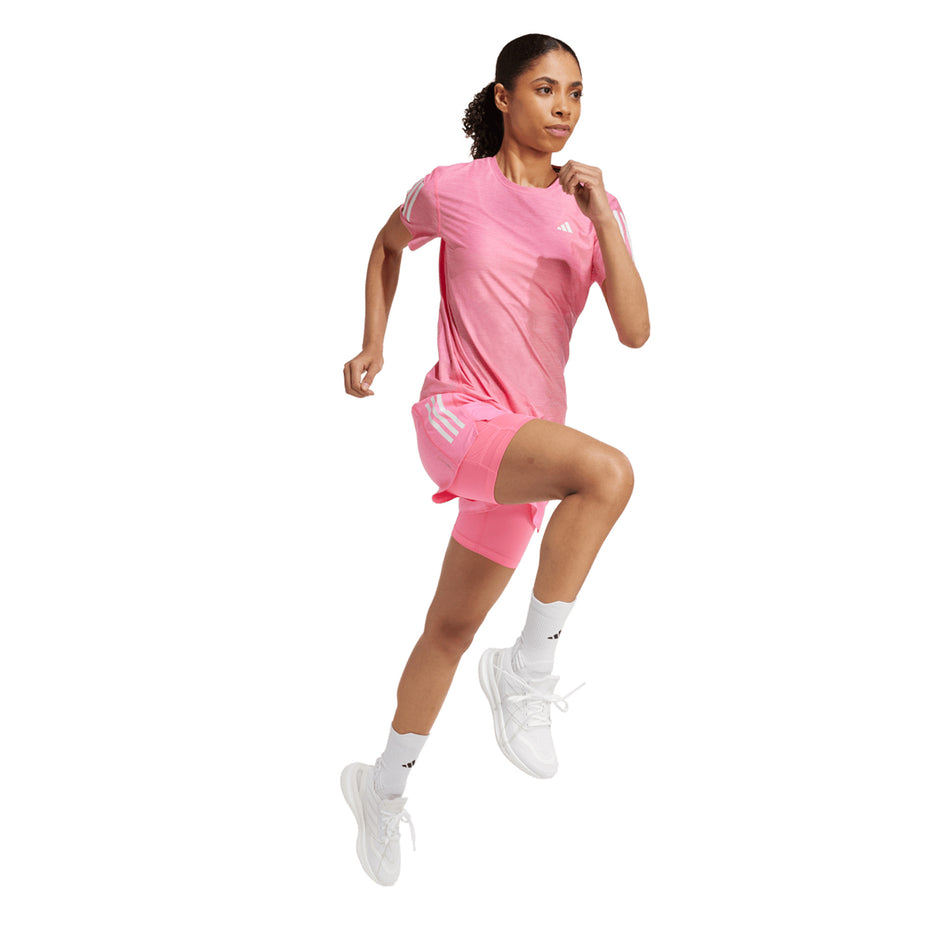 Front view of the adidas Women's Own The Run Base Tee in the Lucid Pink/White colourway. (8665232670882)