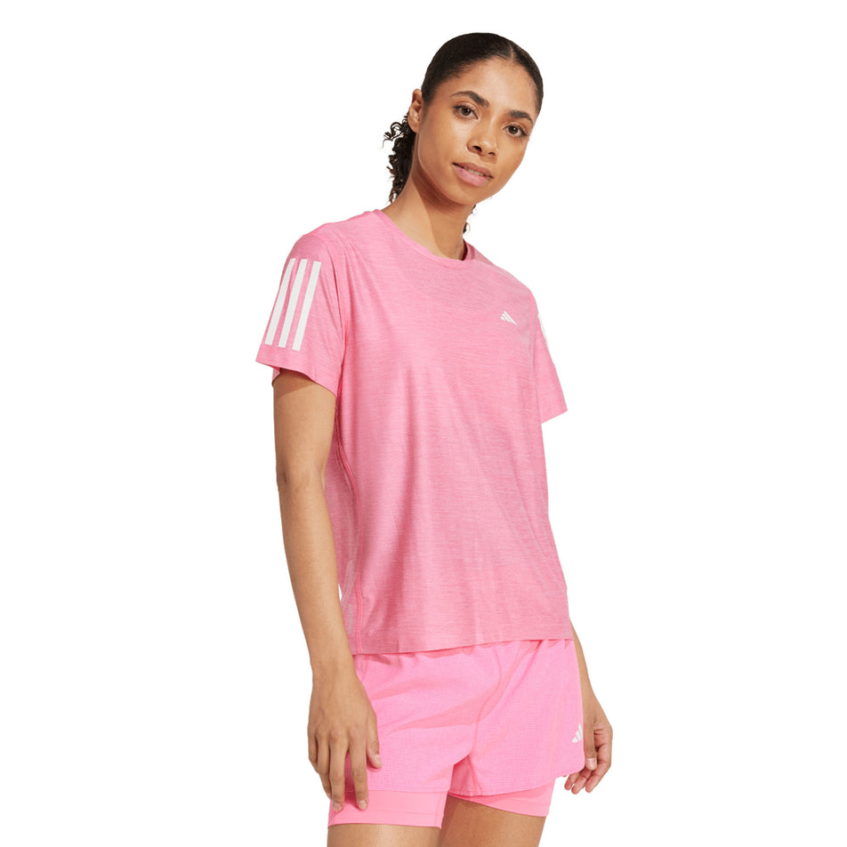 Front view of the adidas Women's Own The Run Base Tee in the Lucid Pink/White colourway. (8665232670882)