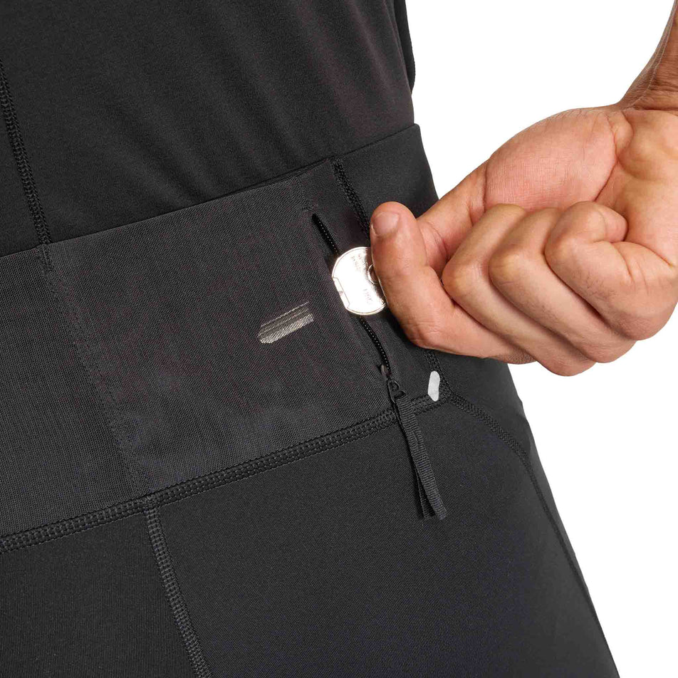 Close-up view of the zip pocket on the adidas Men's adi365 Short Tight in the Black colourway.