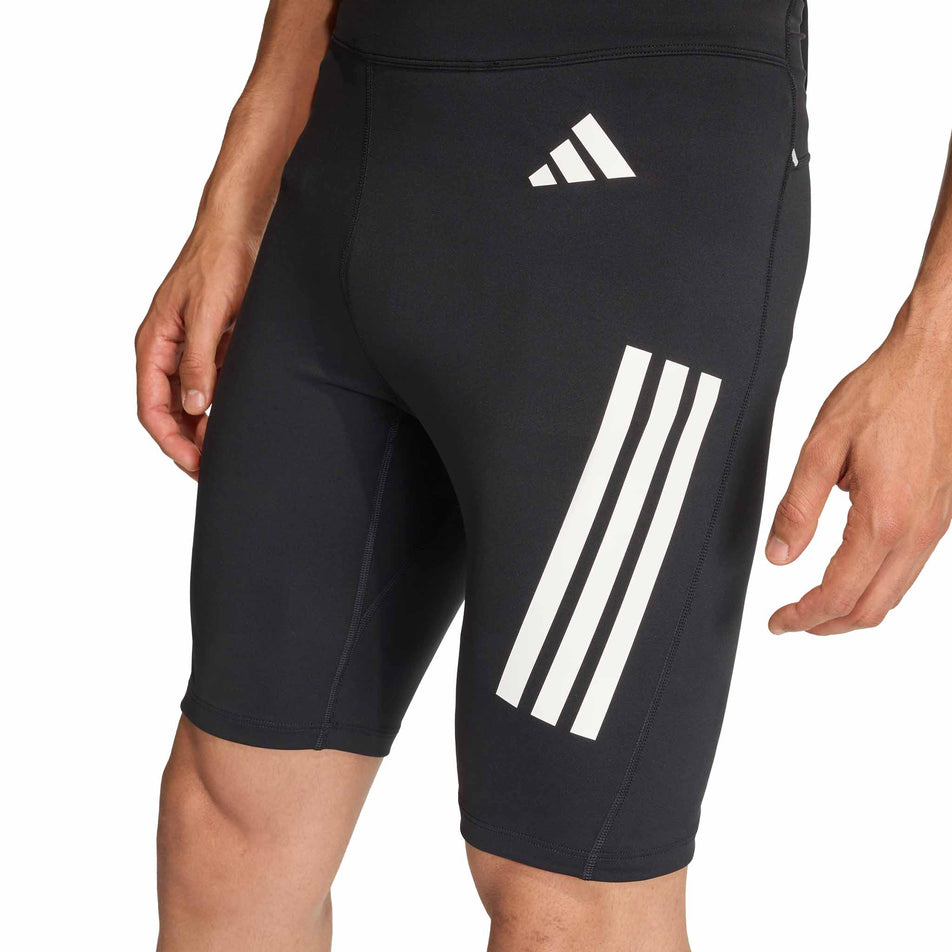 Front view of a model wearing the adidas Men's adi365 Short Tight in the Black colourway.