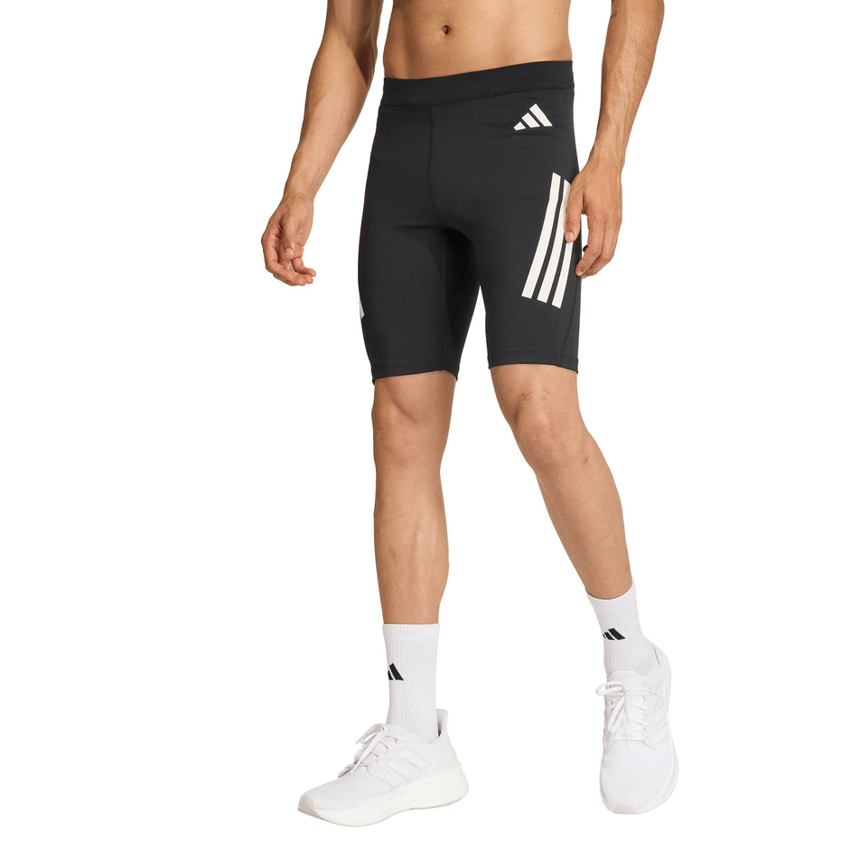Front view of a model wearing the adidas Men's adi365 Short Tight in the Black colourway.