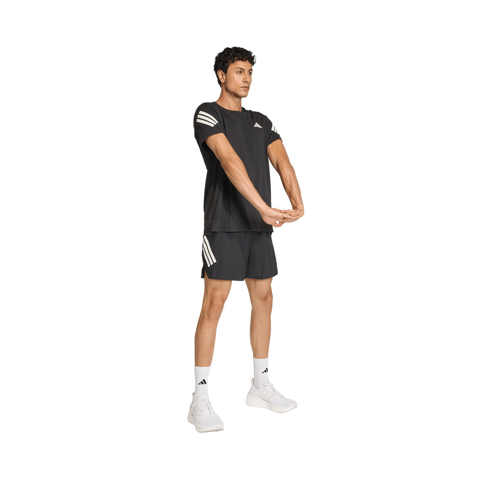 Angled view of a model wearing the adidas Men's adi365 Tee in the Black colourway.
