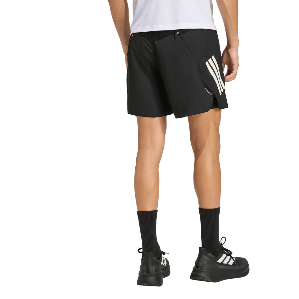 Back view of a model wearing the adidas Men's adi365 2in1 Short in the Black colourway.
