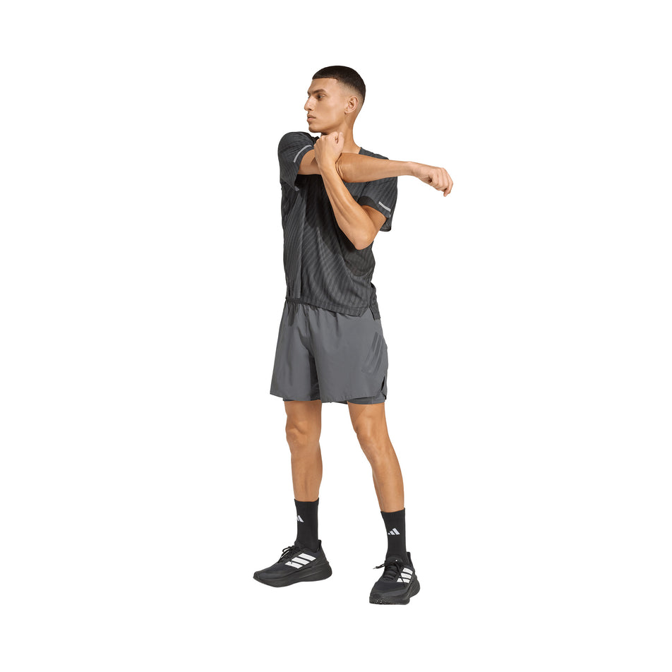 Front view of a model wearing the adidas Men's adi365 Co Tee in the Black colourway.