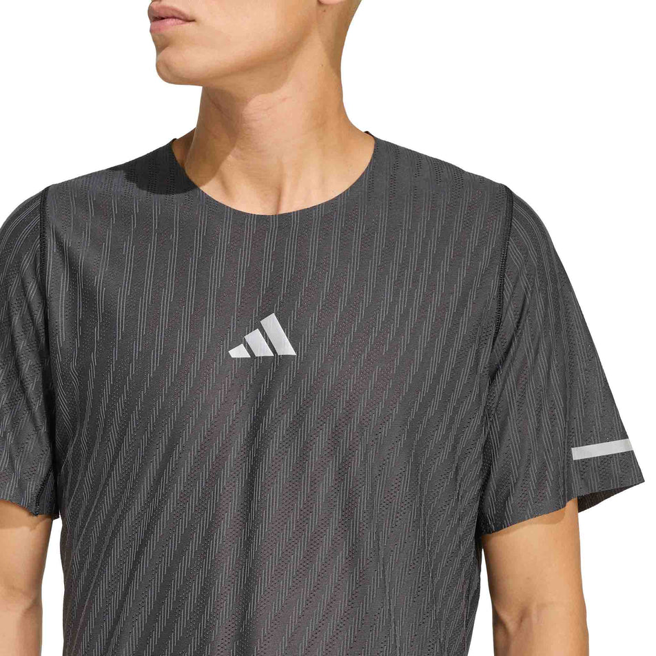 Front view of a model wearing the adidas Men's adi365 Co Tee in the Black colourway.