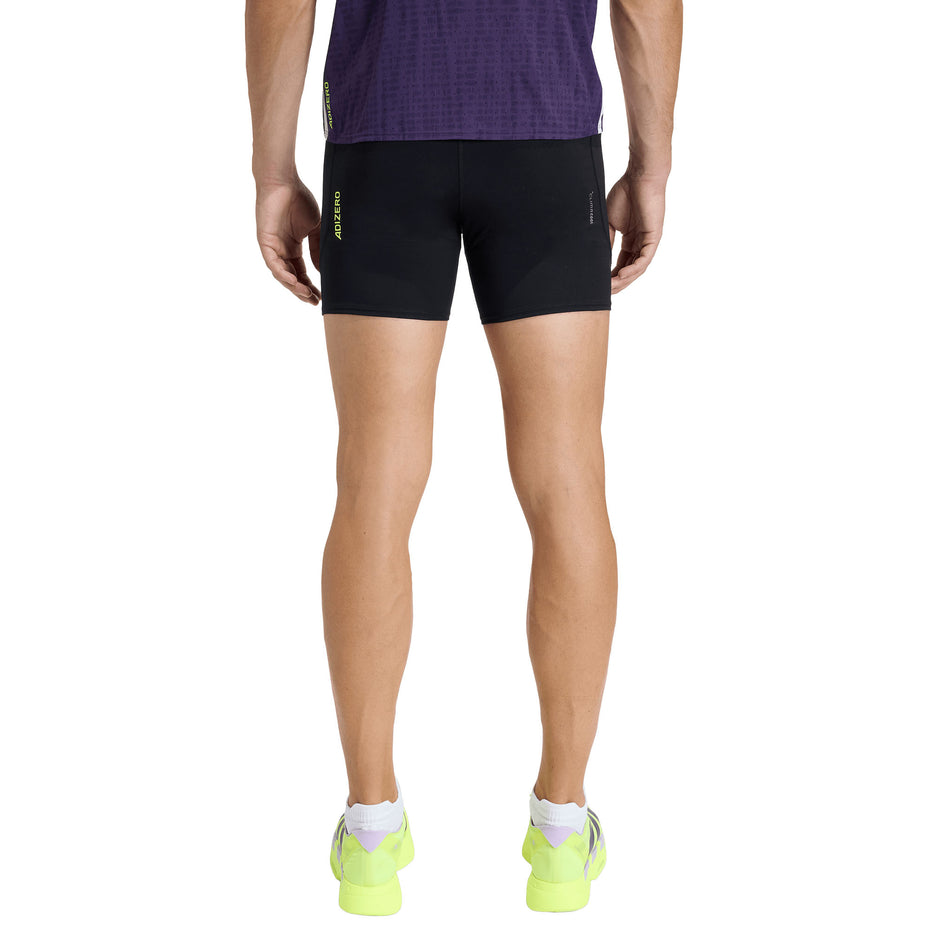 Back view of a model wearing the adidas Men's Adizero Running Short Pocket Tights in the Black colourway.