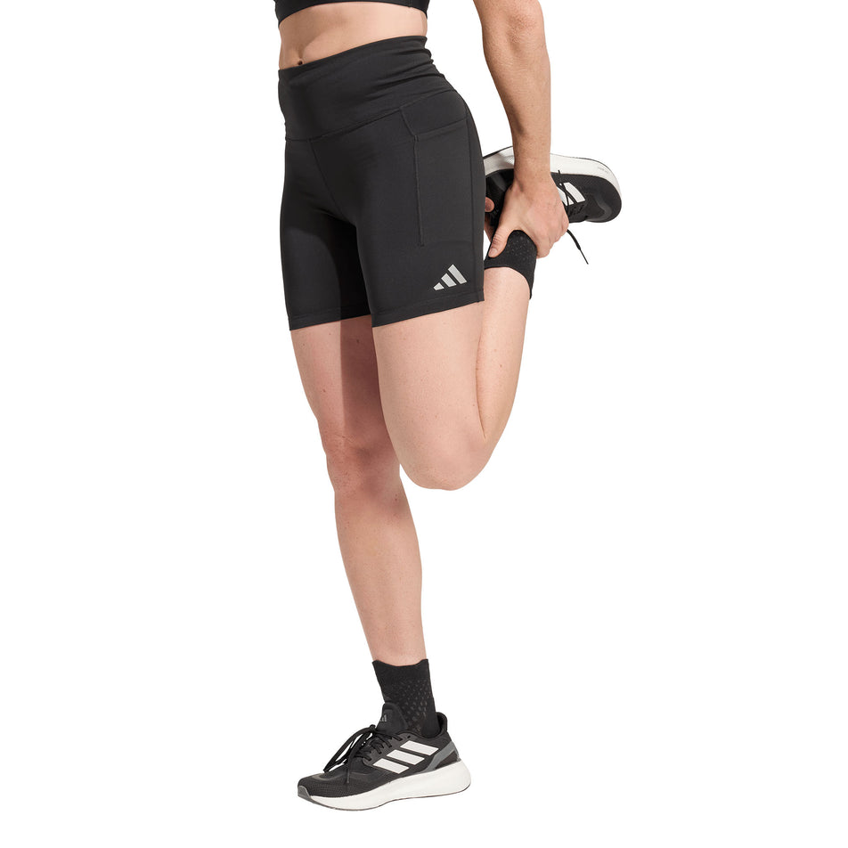 Angled view of a model wearing the adidas Women's adi365 Climacool Running Short Leggings in the Black colourway.