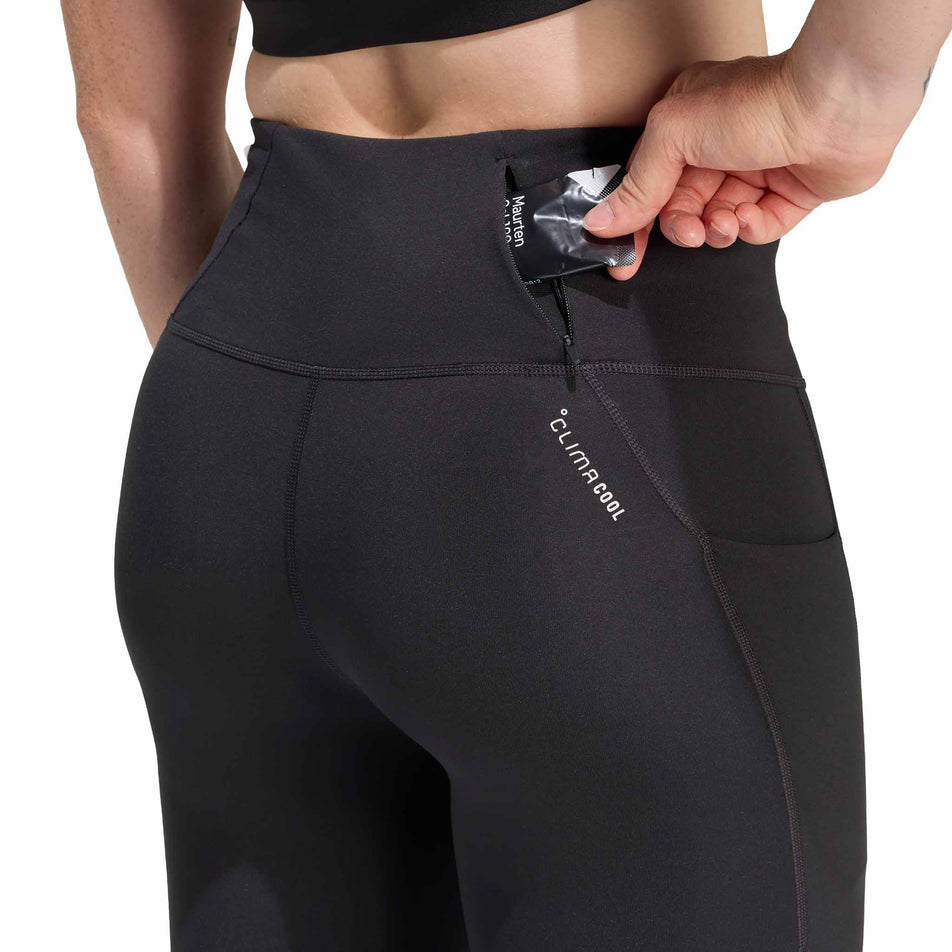 The zip pocket on the back of the adidas Women's adi365 3S 1/1 Tights in the Black colourway.