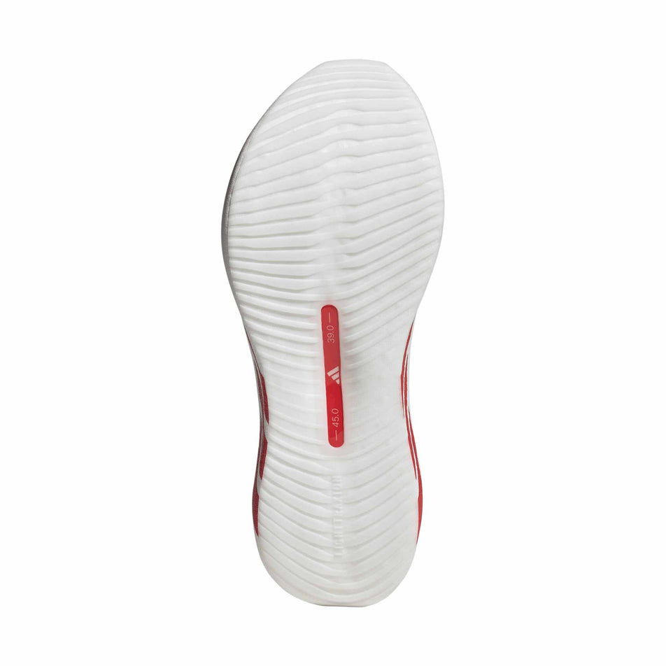 The outsole of the right shoe from a pair of adidas Men's Hyperboost Edge Running Shoes in the Ftwr White/Pure Ruby/Zero Met. colourway.