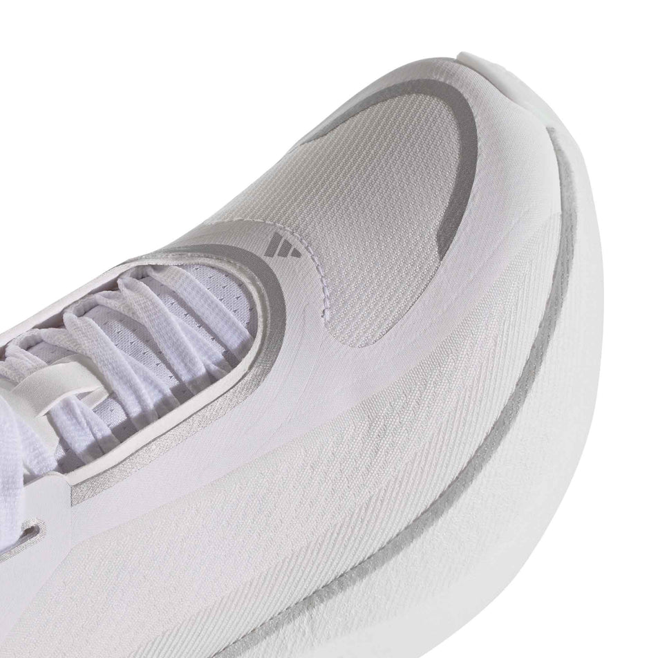 The toe box of the right shoe from a pair of adidas Women's Hyperboost Edge Running Shoes in the Ftwr White/Silver Met./Zero Met. colourway.
